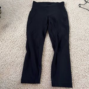 Black cropped compression leggings thigh pockets, draw string & waistband pocket